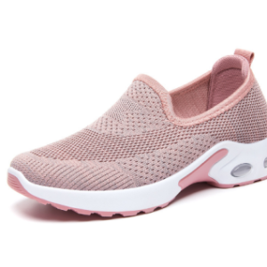 A pink sneaker with white sole and a light pink heel.