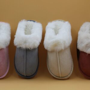 Four pairs of cozy winter slippers with fluffy white linings in different colors.