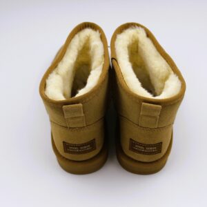 Pair of tan suede winter boots with fleece lining.